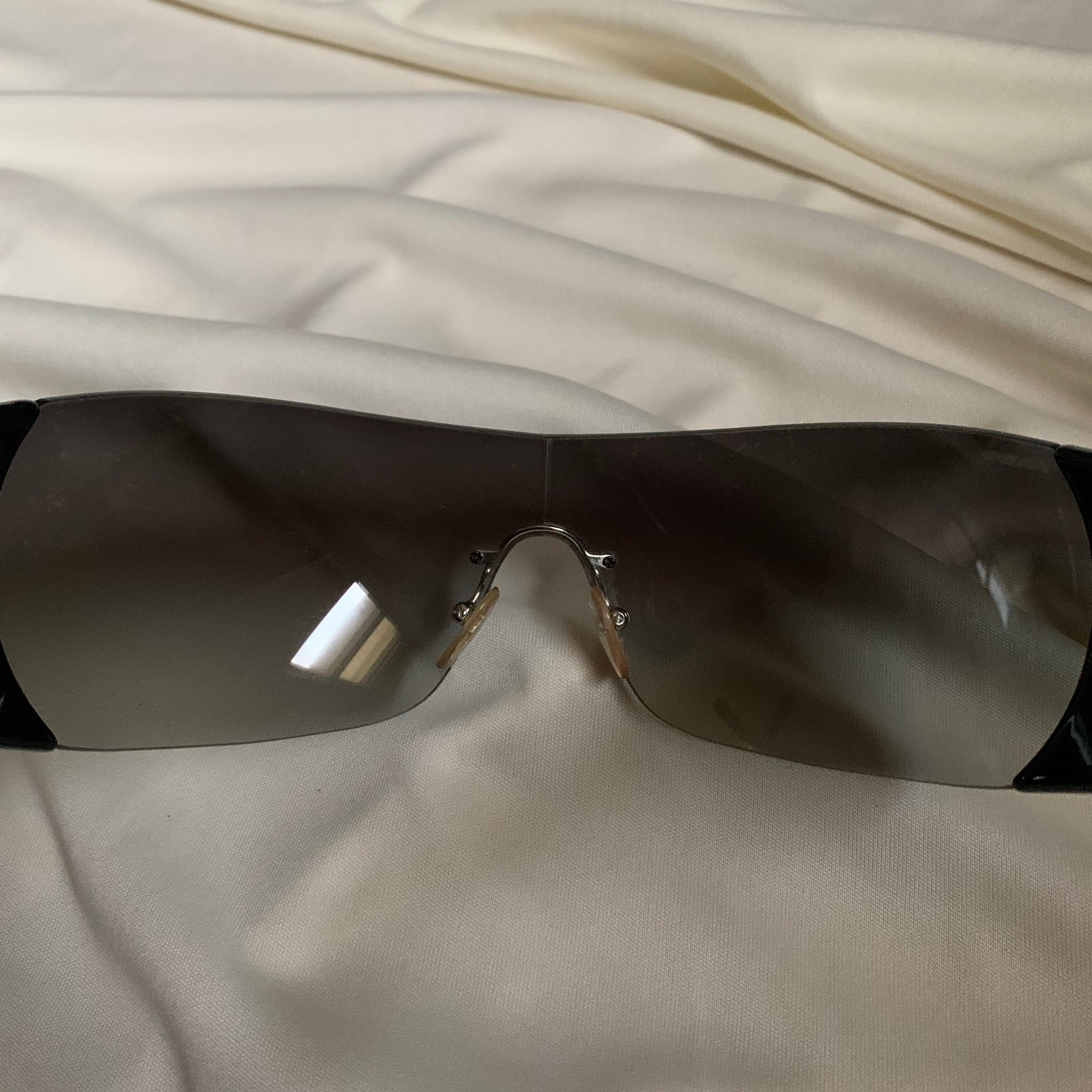 Prada Black Rimless Visor Shield Gradient Sunglasses