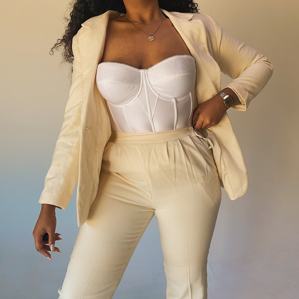 vintage suit creme colored with chic white vintage bustier 